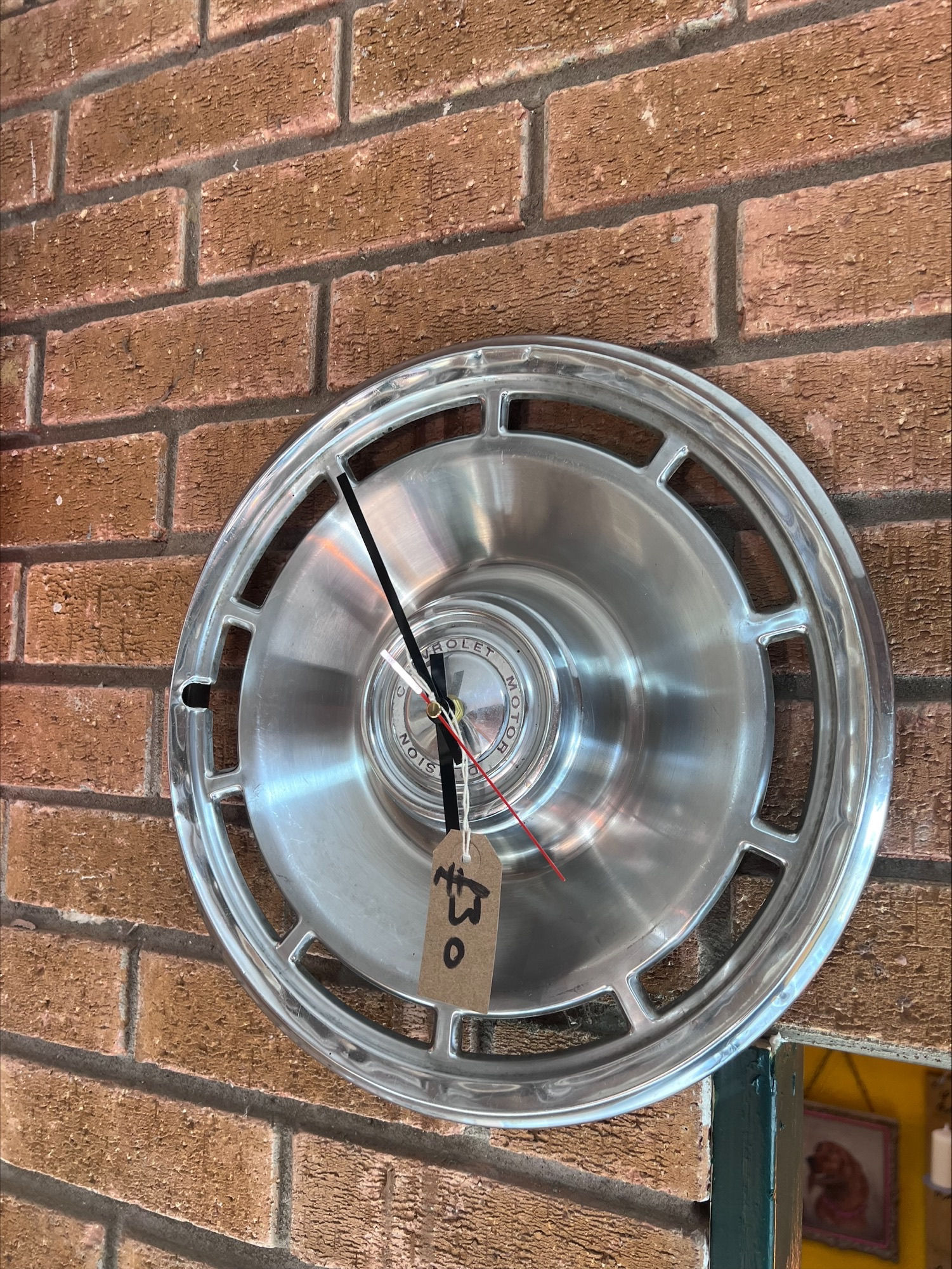 SOLD American car hubcap wall clock