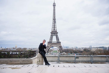 Diego Caetano in front of the Eiffel Tower 