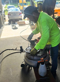 Mr. John Hasogolmong performed a pressure valve test on the CTSI Saipan cargo tank.