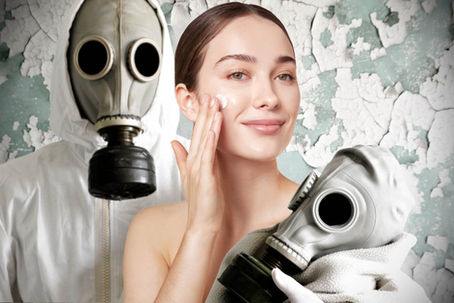 Woman smiling, applying cream, amid people in gas masks. Cracked paint background suggests decay. Contrast between serenity and threat.