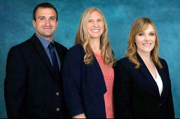 A group picture of John, Lauren, and Larissa
