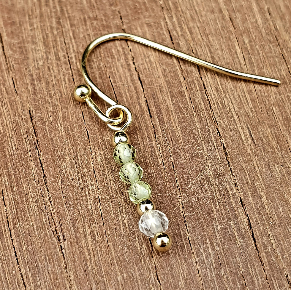 Kiss Me Earrings in 18k gold plate with 3 faceted peridot and 1 faceted quartz