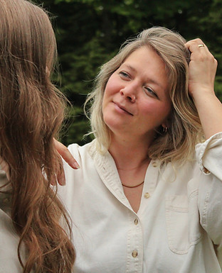 woman with hand in hair