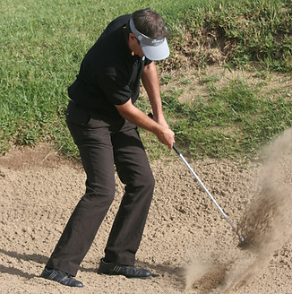 salida de bunker golf