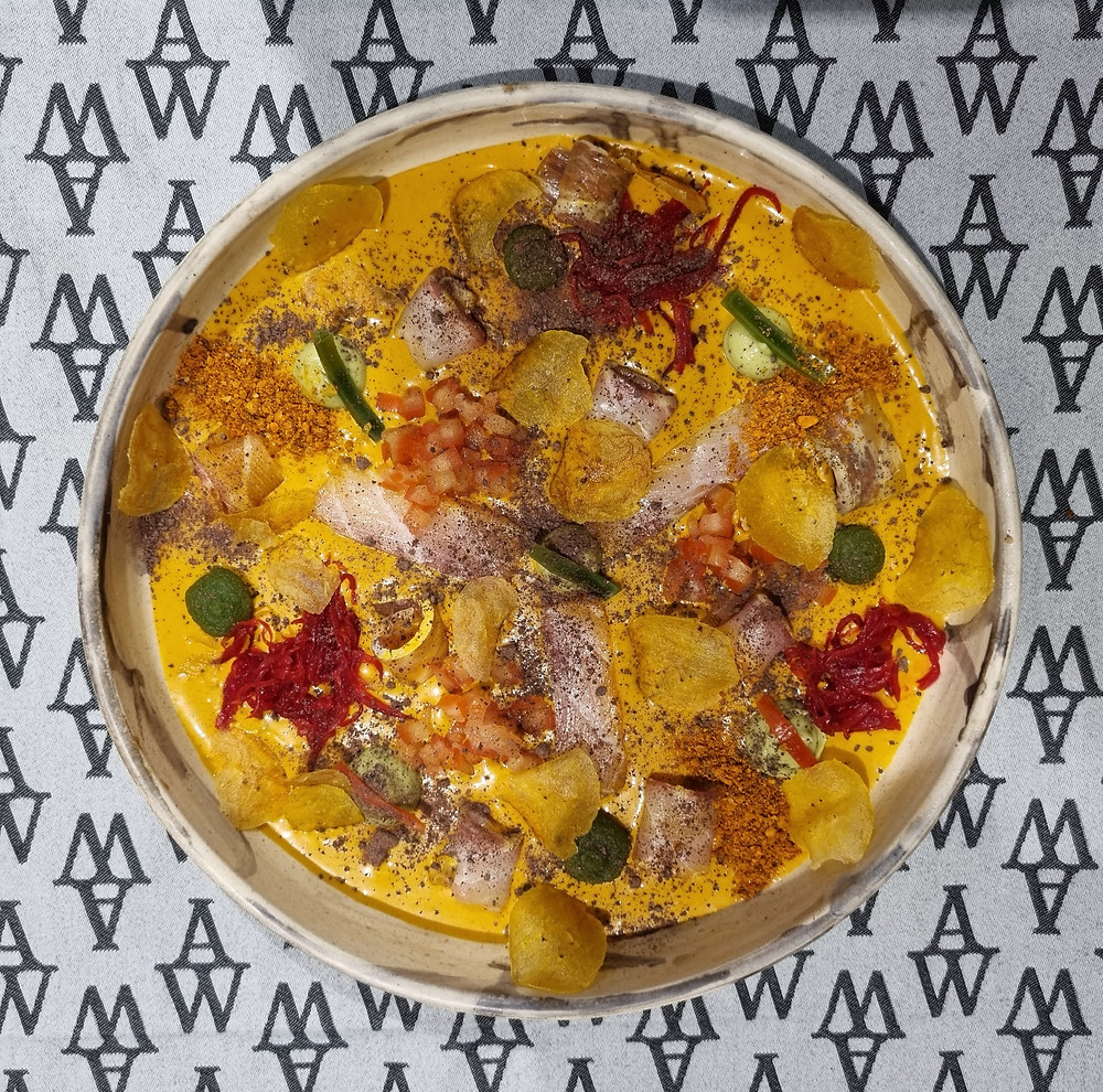 Ceviche de corvina con leche de tigre de maní.
