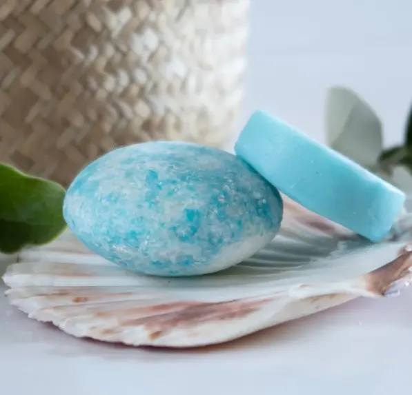Thumbnail: Two blue solid soap bars on a seashell