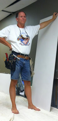 Guy working in shorts and barefoot 1.jpg