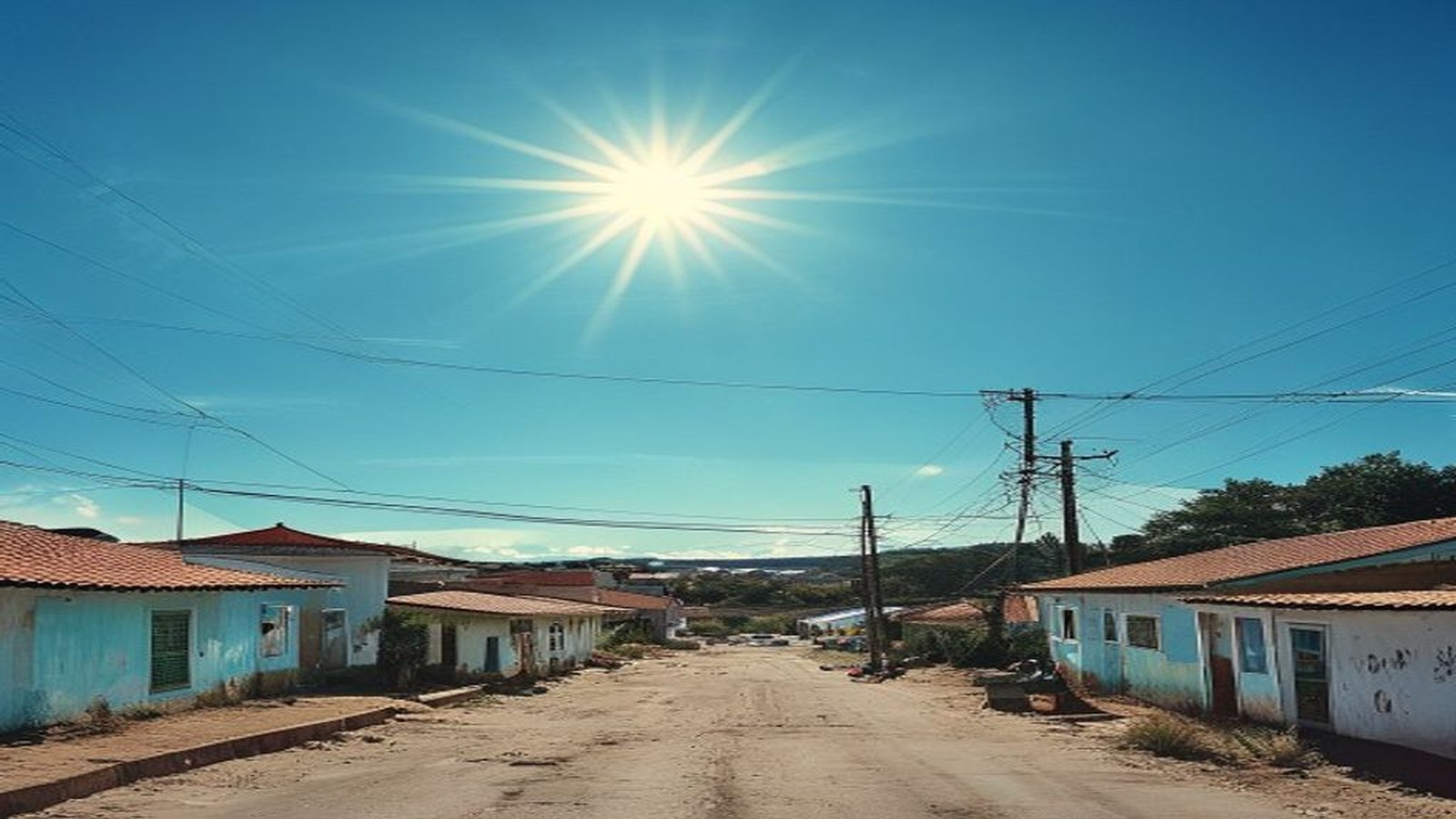 Céu azul de inverno com sol sobre paisagem urbana de cidade do interior do Rio Grande do Sul, sem pessoas — Camaquã