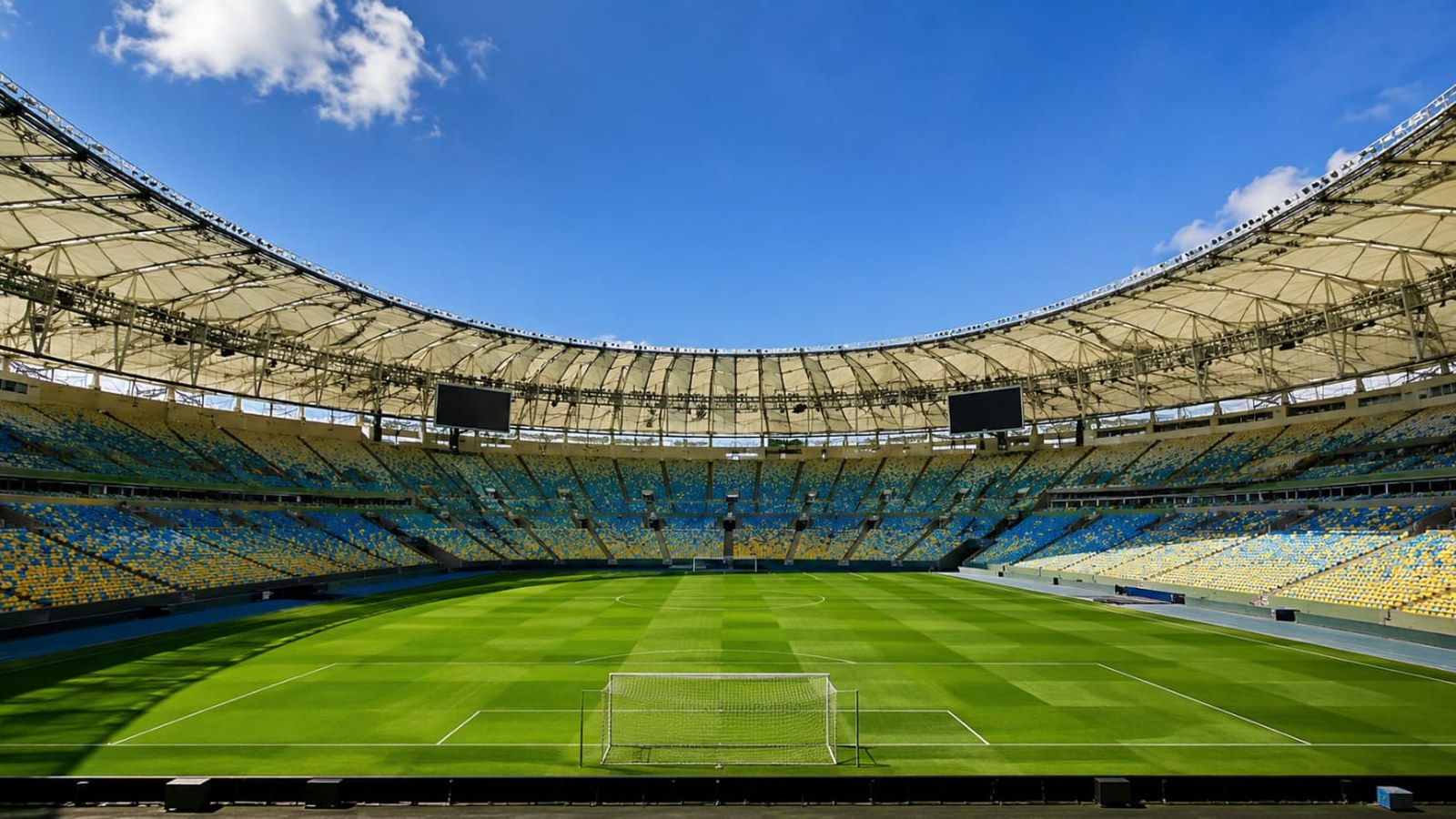 Jogadoras em campo durante partida de futebol feminino: Brasil sediará a Copa do Mundo de 2027.