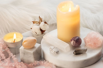 Serene candle and crystals in light colors