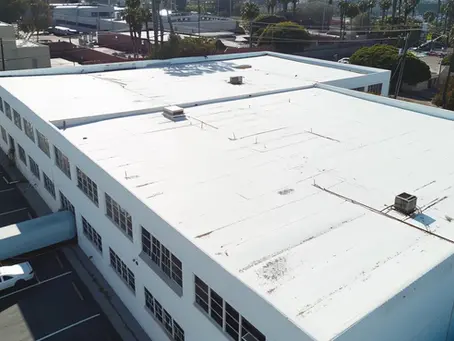 Why Santa Monica Businesses Are Choosing Spray Coating Over Full Roof Replacements