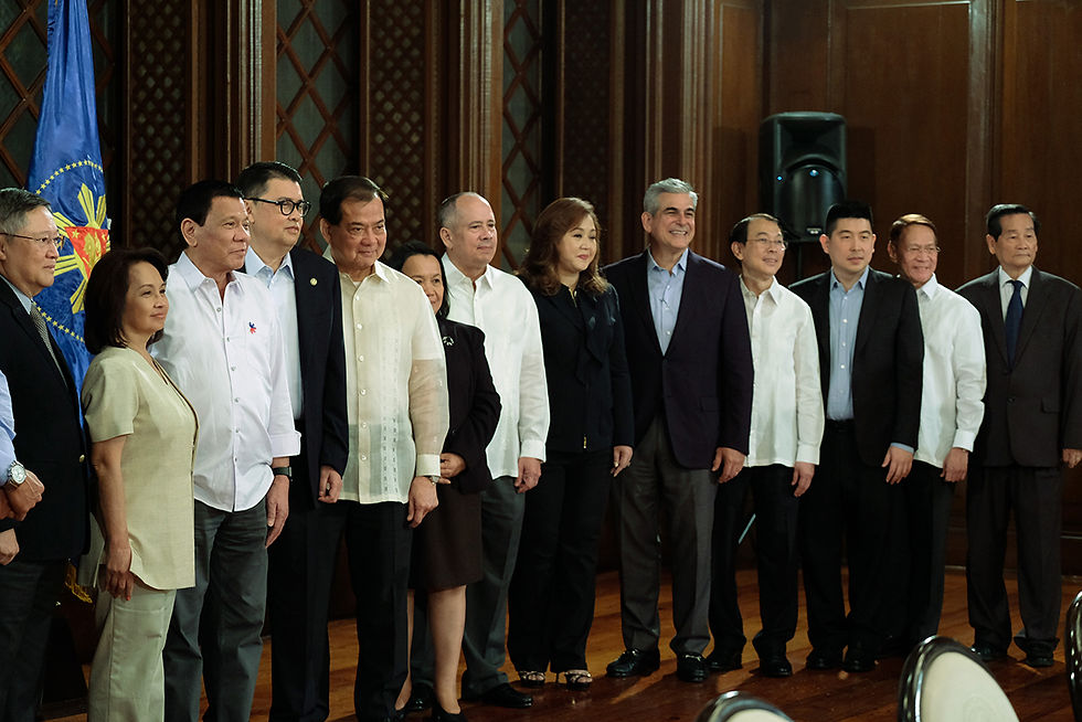 Alice Eduardo with businessmen
