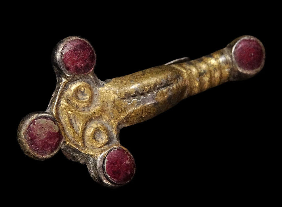 Thumbnail: Merovingian silver-gilt fibula adorned with garnets