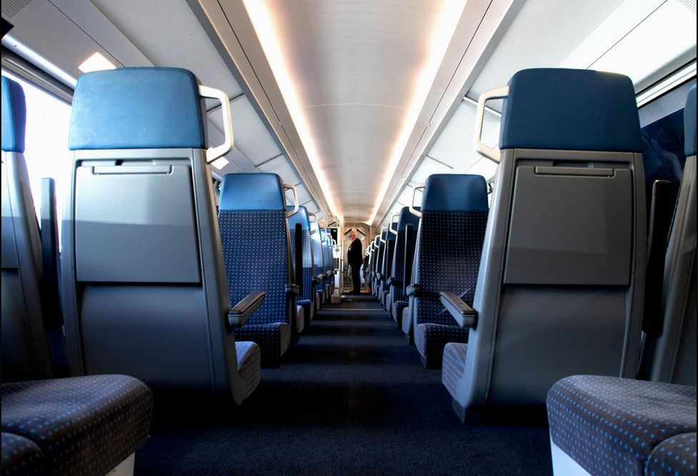 Interior travel photography empty train aisle perspective Studio Barco