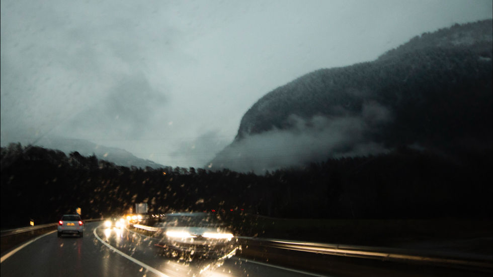 Cinematic travel photography rainy highway and mountains Zurich Studio Barco