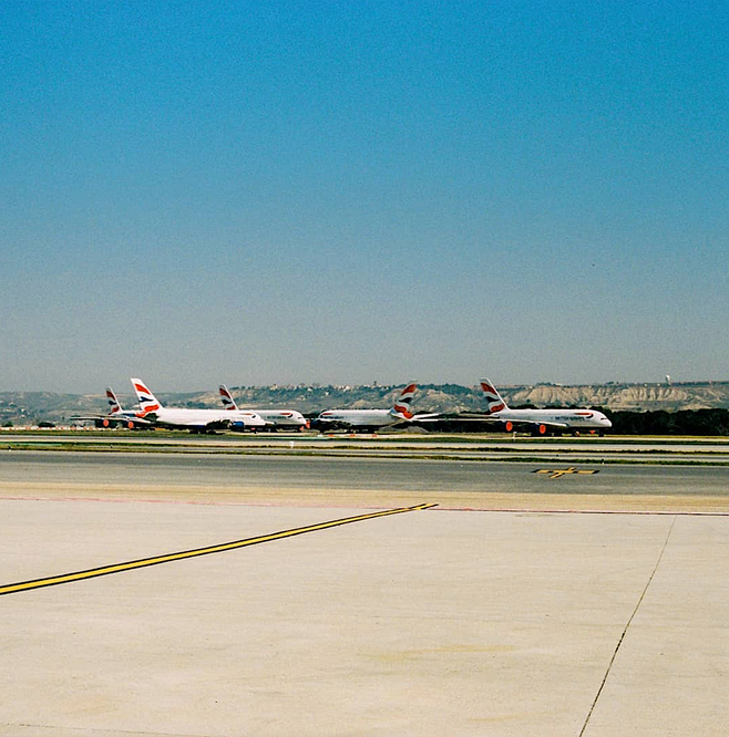 Travel photography airport tarmac and commercial planes Zurich Studio Barco