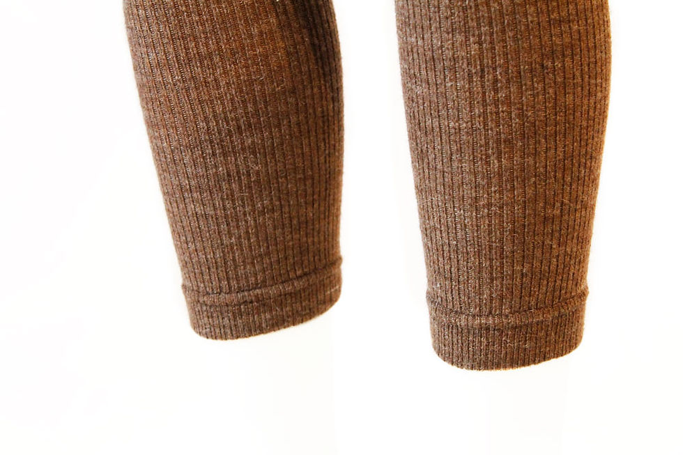 Thumbnail: Bottoms of legs of light brown knit wool leggings with small cuff at ankle
