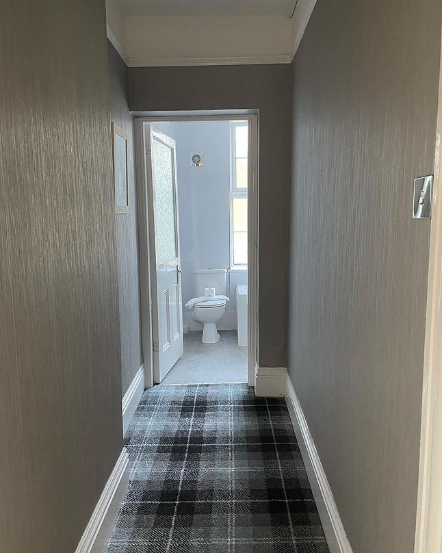 corridor leading to bathroom