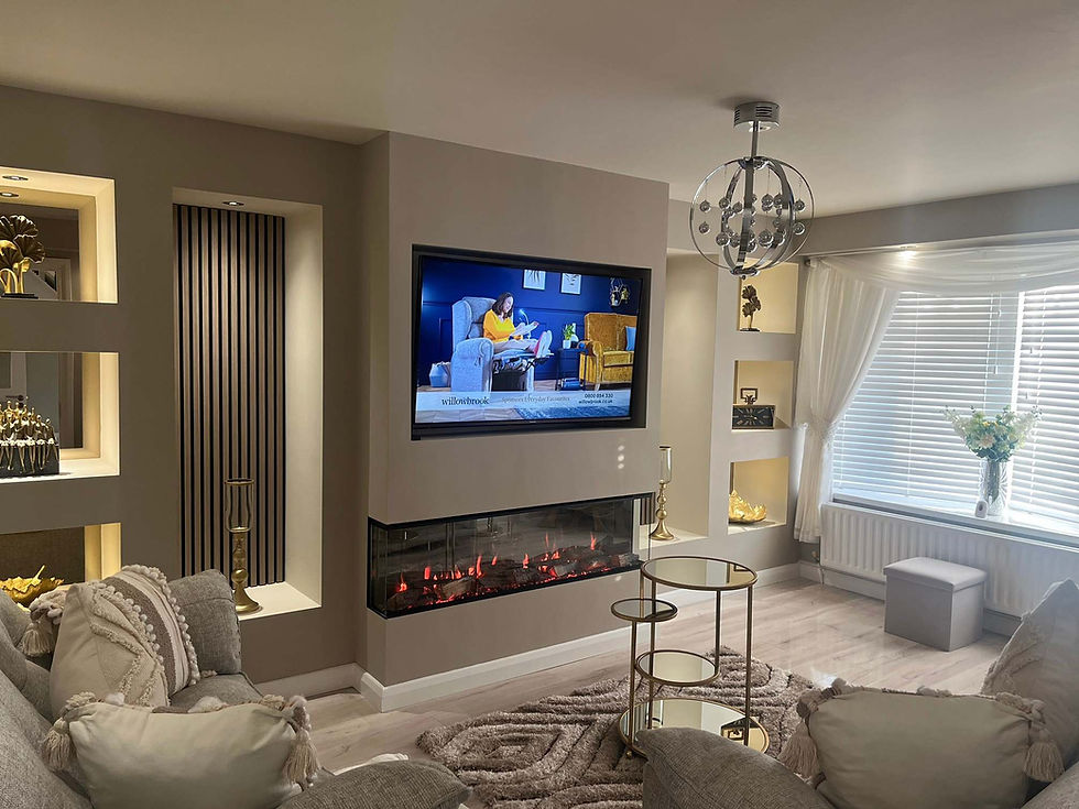 Contemporary living room media wall featuring a flush TV above a glowing electric fireplace with backlit display alcoves.
