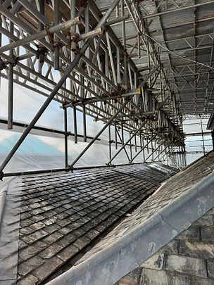 Inside a construction site of a building featuring a scaffolding.