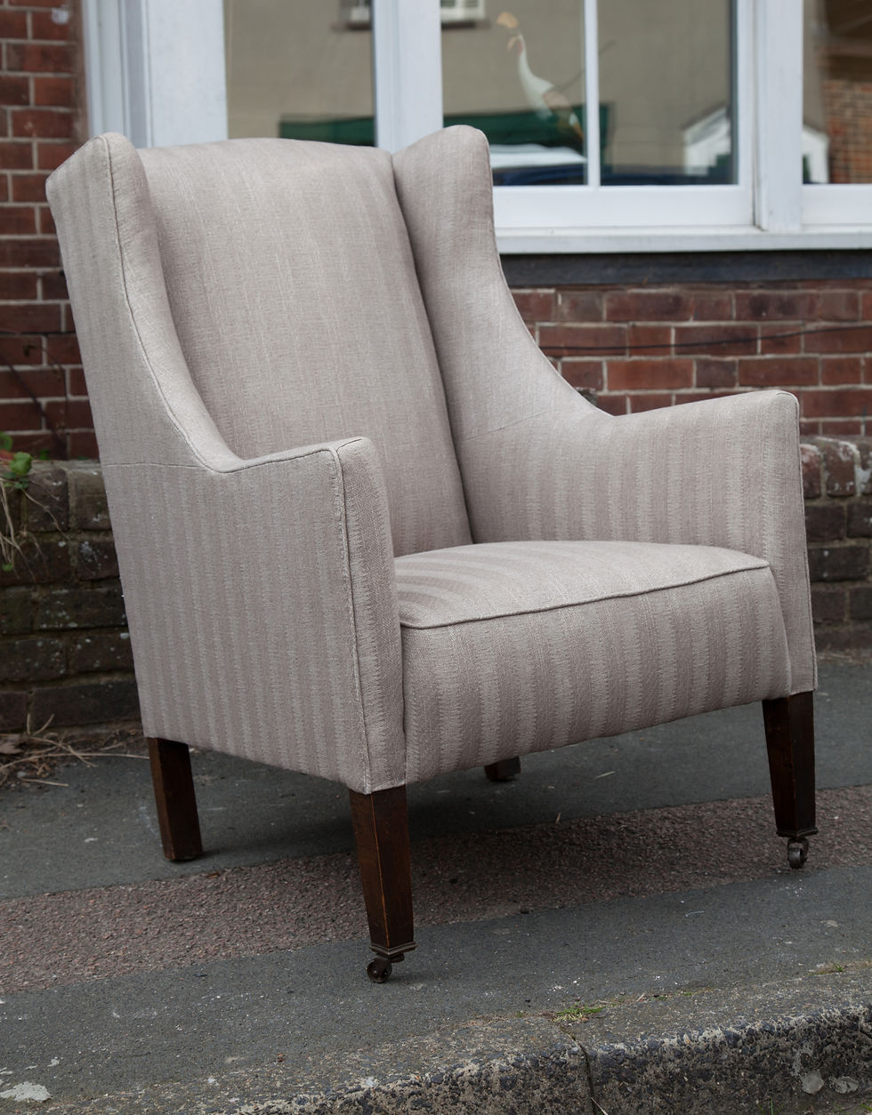 Armchair frame stripped for reupholstery