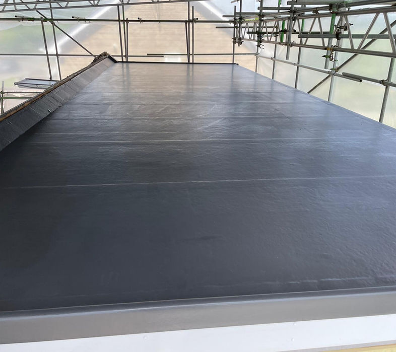 roof built next to scaffolding 