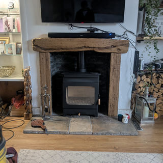 Severe crack splitting a curved stone border or coping stone