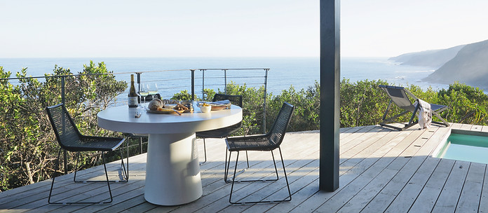 Garden Route Luxury Accommodation. Outside seating with endless views.
