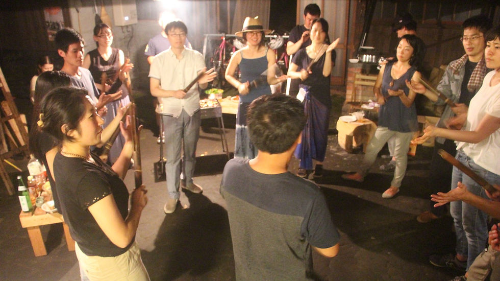 Playing Bamboo Music Instruments 