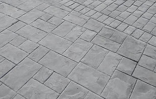 Pav. impreso Piedra sellar+adoquin recto rústico c/cenefa