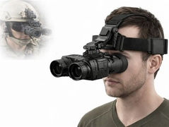 A man wearing head-mounted infrared goggles used for thermal imaging