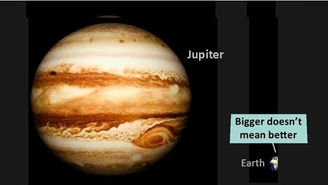 Size comparison of Jupiter and Earth showing Jupiter much larger, with a note that bigger doesn’t mean better.