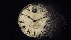 Abstract image of a vintage clock labeled 'Uniform Time' dissolving into darkness, representing the passage and mystery of time