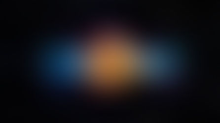 Artistic representation of wave–particle duality, illustrating how quantum objects exhibit both localized particle behaviour and wave-like propagation described by the wavefunction.