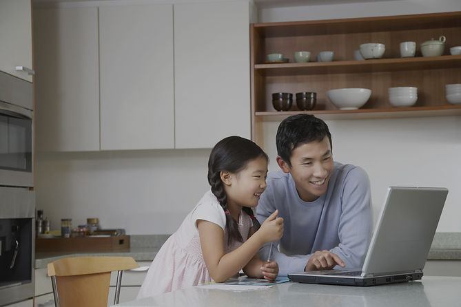 Father and daughter at computer_edited.jpg