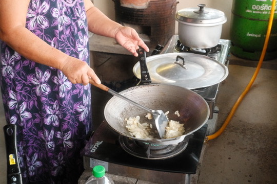 one of thai woman is prepared breakfast for family. 