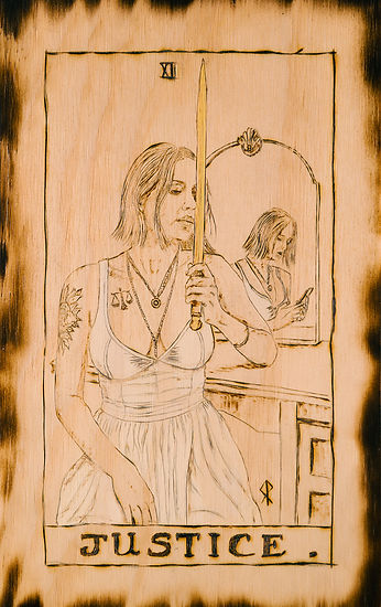 A woman holds a sword with scales over her heart as her reflection stares at a phone, symbolizing lost alignment and inner truth.