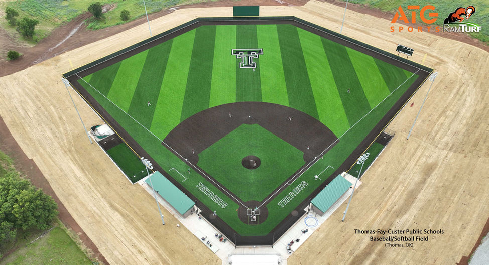 Thomas–Fay–Custer High School baseball field in Thomas, Oklahoma, completed in 2025, featuring a clean synthetic turf surface, precise field markings, and a modern, high‑performance design that enhances safety, durability, and year‑round play for student‑athletes.