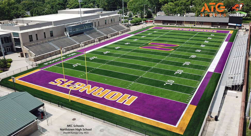 North Kansas City Schools’ Northtown High School football field, completed in 2025, featuring a modern synthetic turf surface, bold Hornets branding, and enhanced performance upgrades that improve safety, durability, and year‑round playability for student‑athletes.