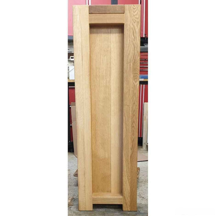 Chunky rustic oak bookcase handmade from solid oak wood shelving unit UK end view