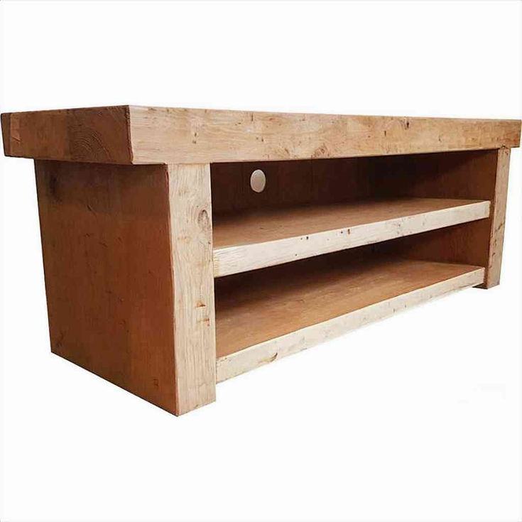 Rustic solid oak TV stand front view in country cottage setting