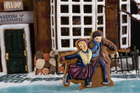 gingerbread house people ice skating