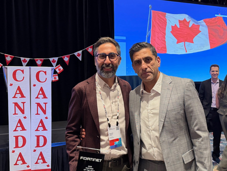 Saeed from FTT Networks accepting the Fortinet Partner of the Year award