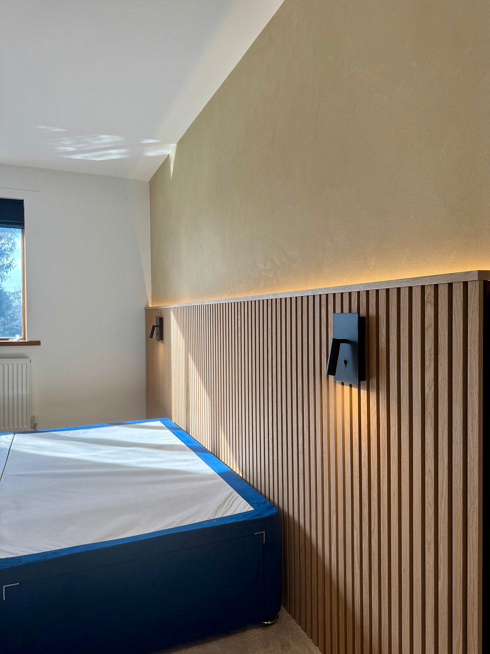 Vertical oak panelling finished with a solid oak top