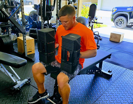 Picture of client performing dumbbell presses