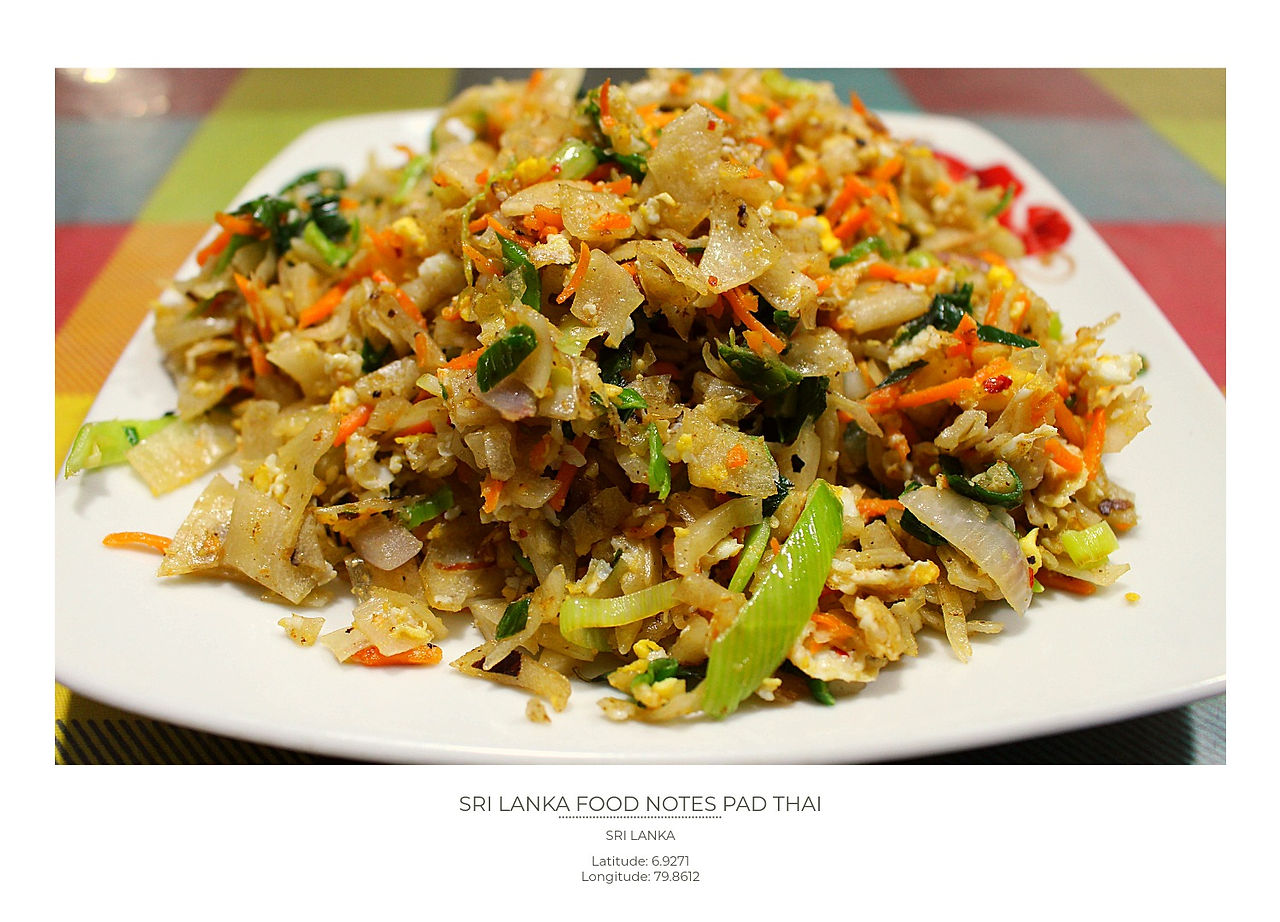 A plate of colorful Pad Thai with noodles, vegetables, and herbs on a checkered tablecloth. Text at bottom reads "Sri Lanka Food Notes Pad Thai."