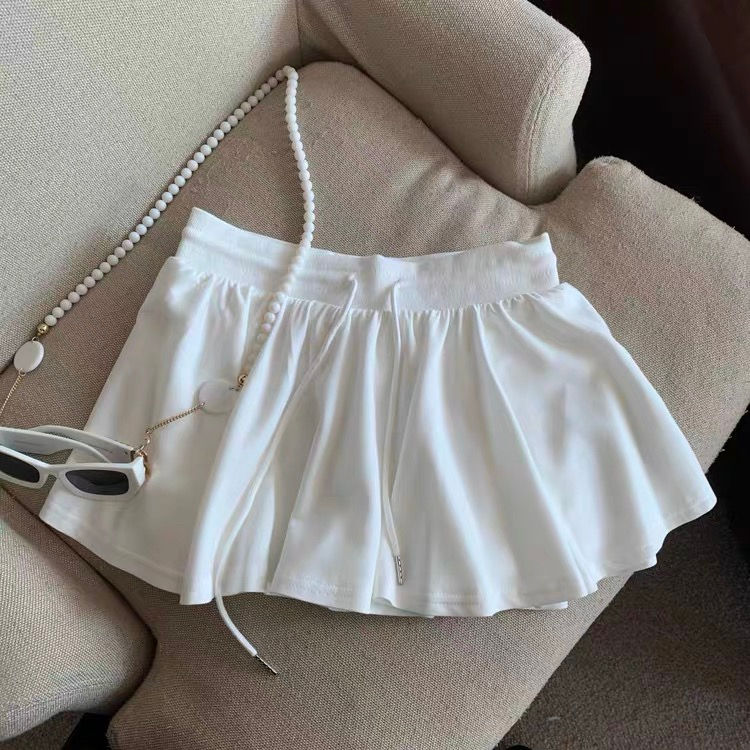 Thumbnail: Mid rise knotted mini skirt
