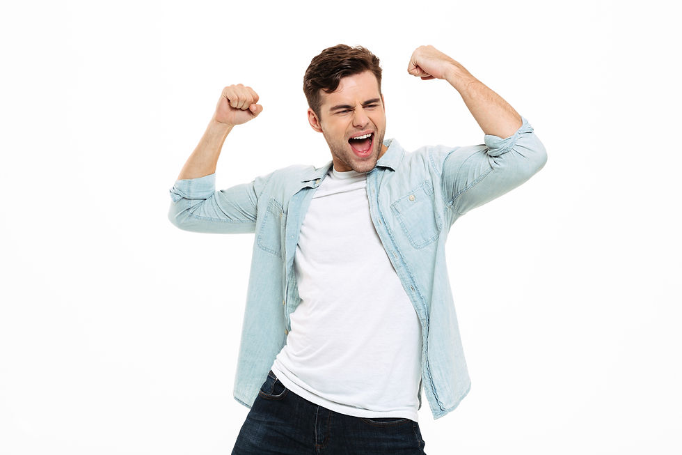 portrait-of-satisfied-young-man-celebrat