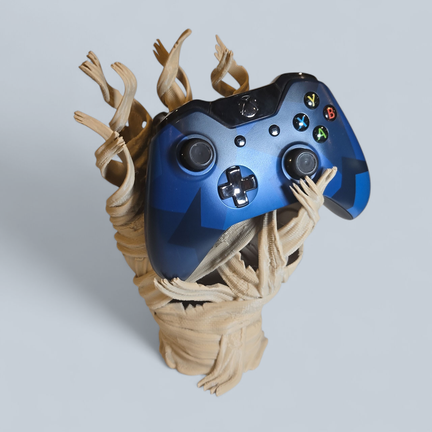 Tomb Holder 3D-printed controller stand with crypt-inspired sculptural design.