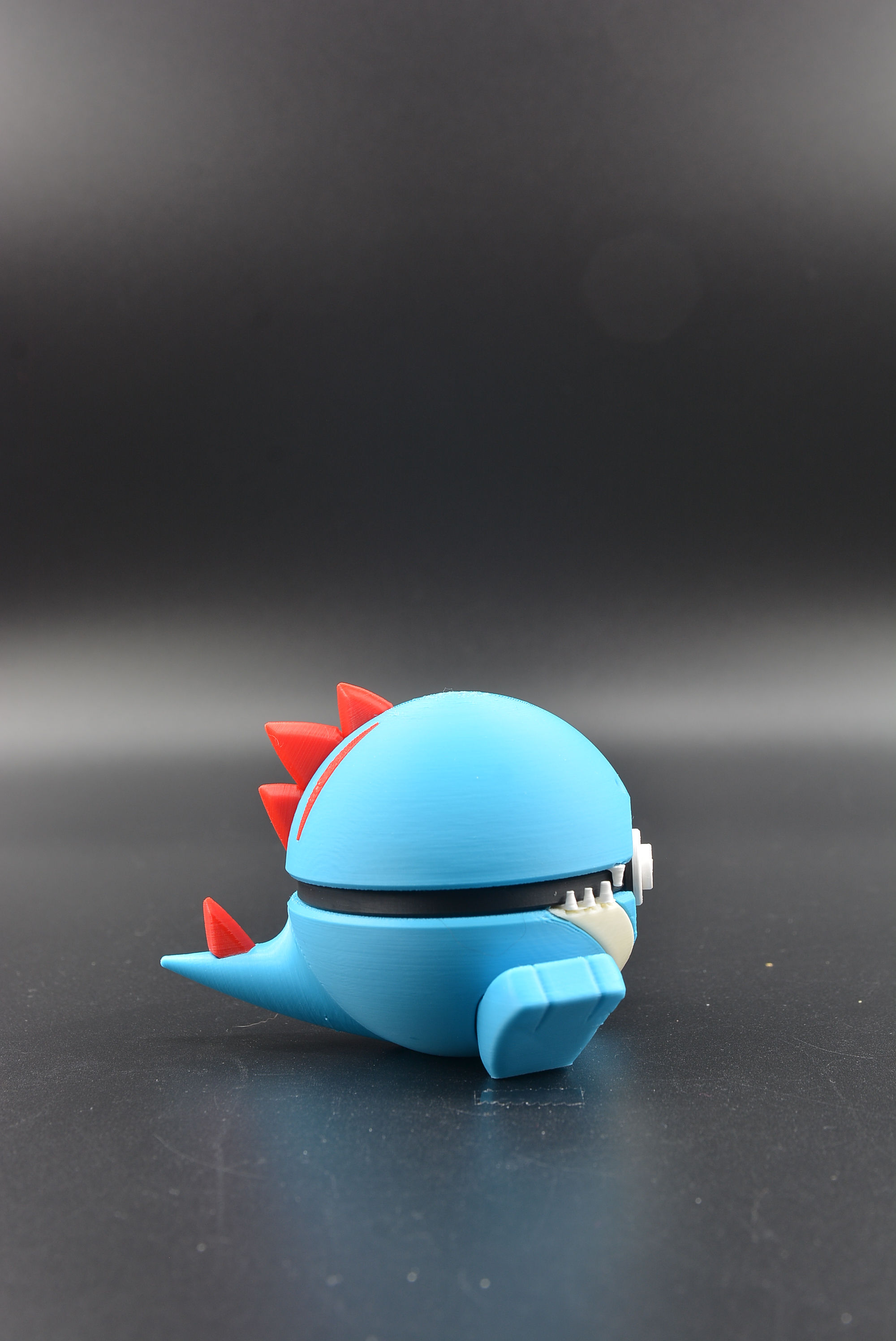 Full‑color Totodile Character Ball with detailed Totodile sculpt.
